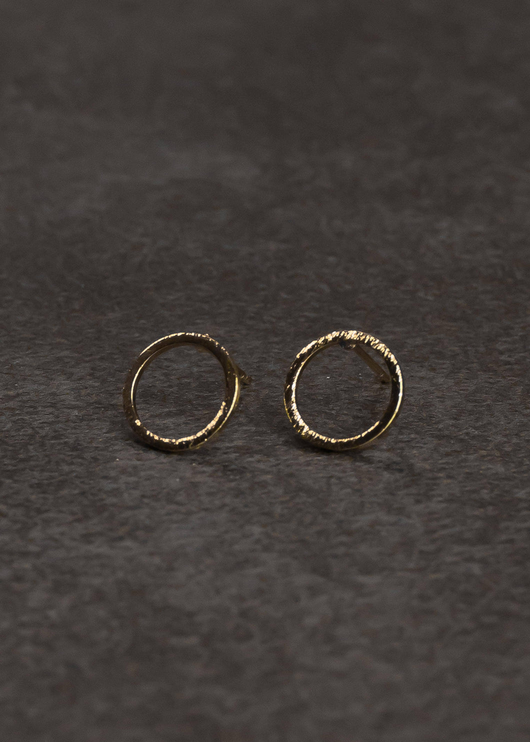 Open circle stud earrings in gold